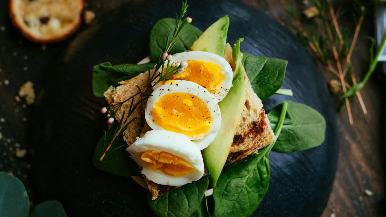 Stale bread pieces on dark slate